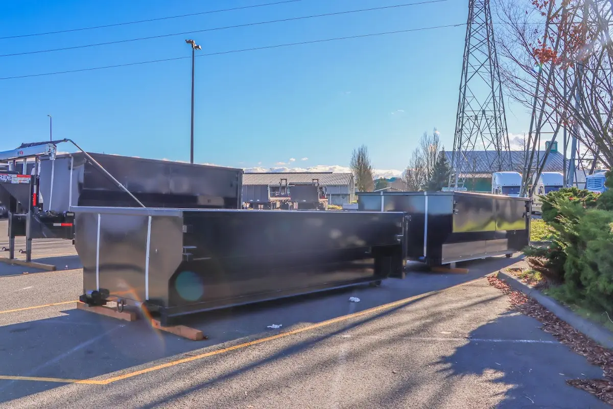 Roll-off dumpster ready for waste disposal at job site for 2 Yard Dumpster Rental in Suitland